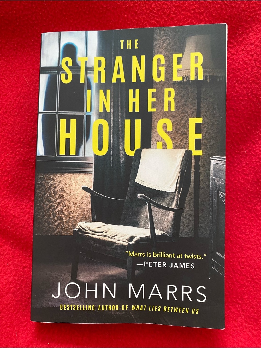 The Stranger in Her House by John Marrs
